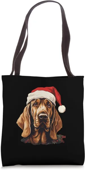 Bloodhound Dog wearing a Christmas hat. Christmas Dog Tote Bag