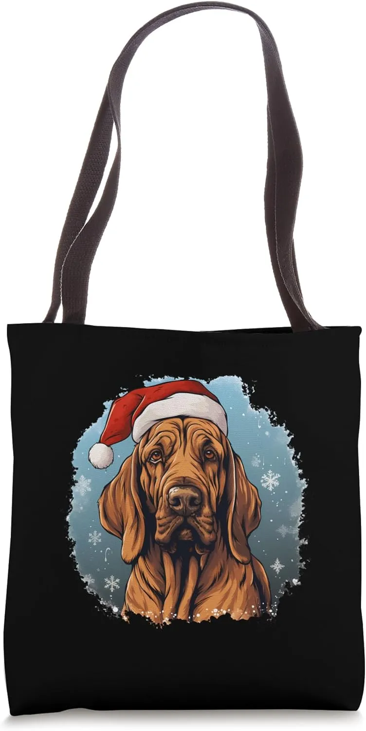 Bloodhound Dog wearing a Christmas hat. Christmas Dog Tote Bag