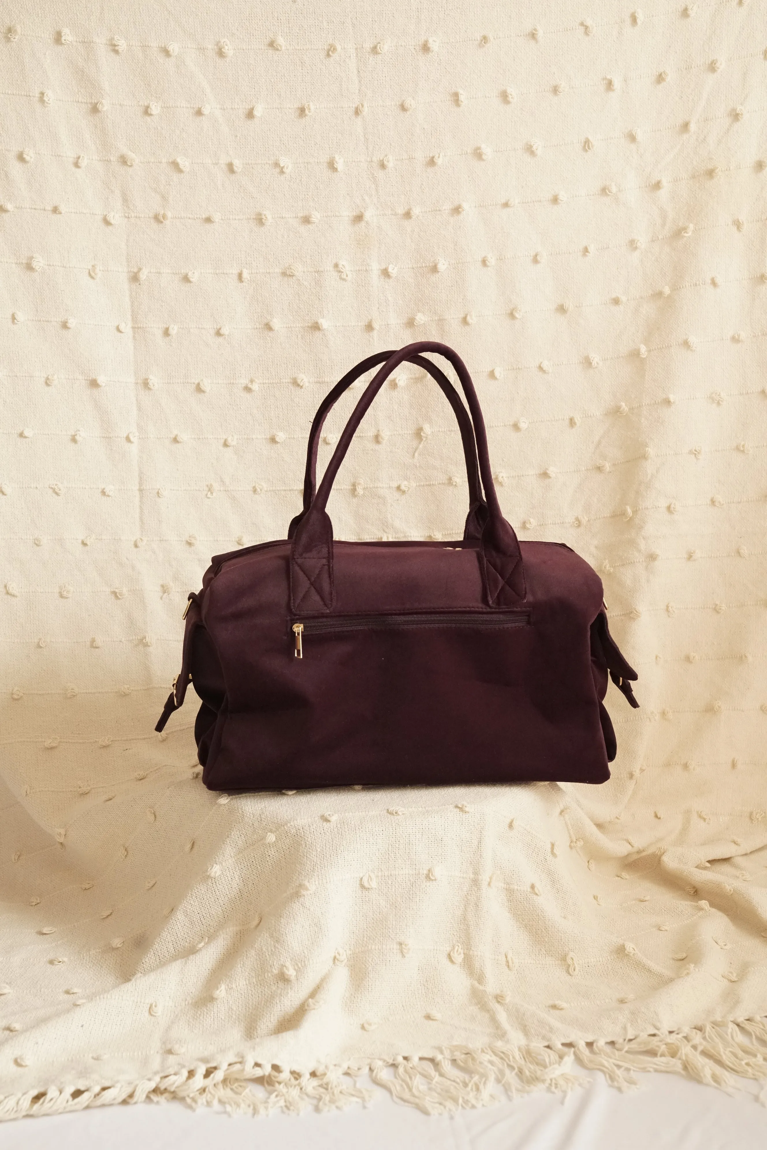 Suede duffle bag